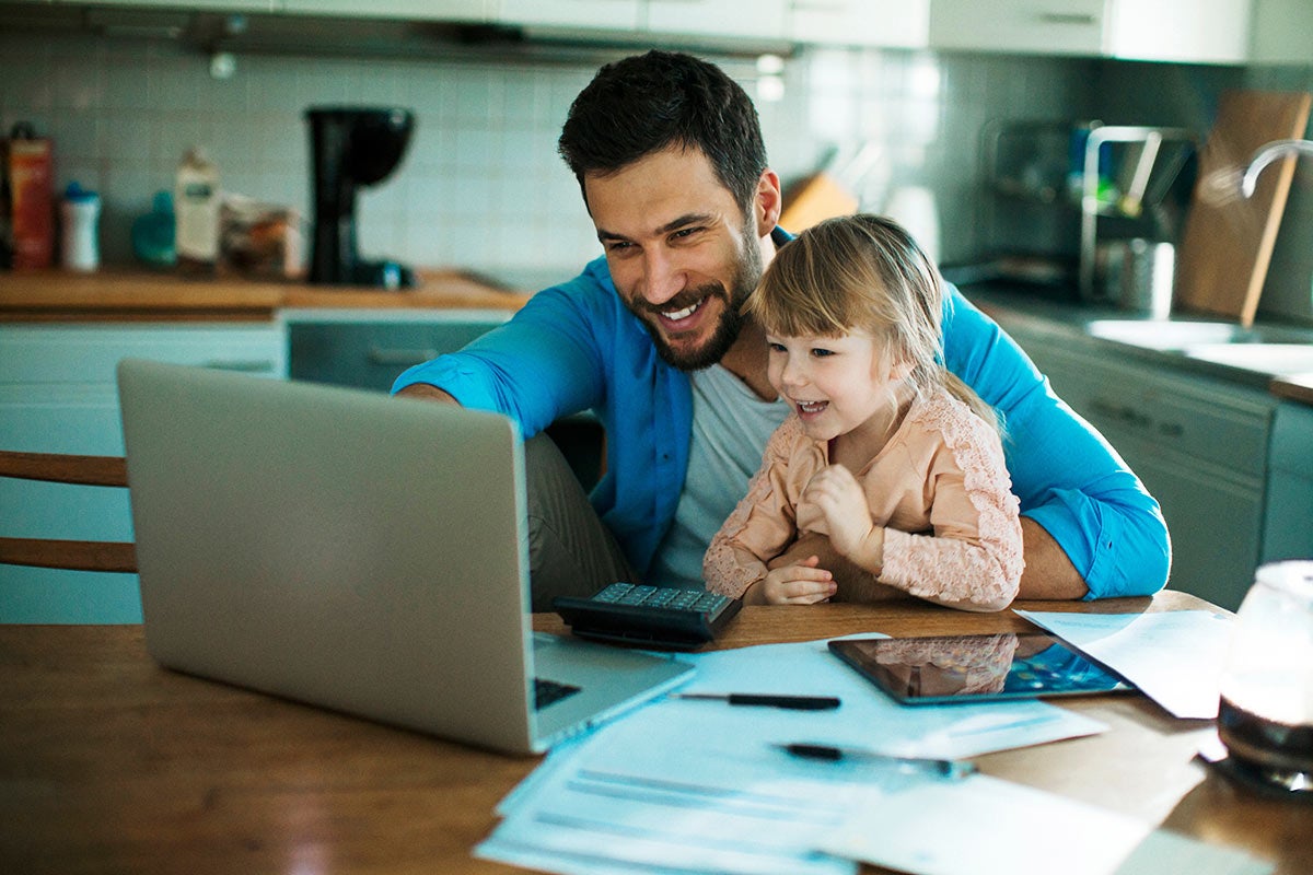 Father Daughter with laptop